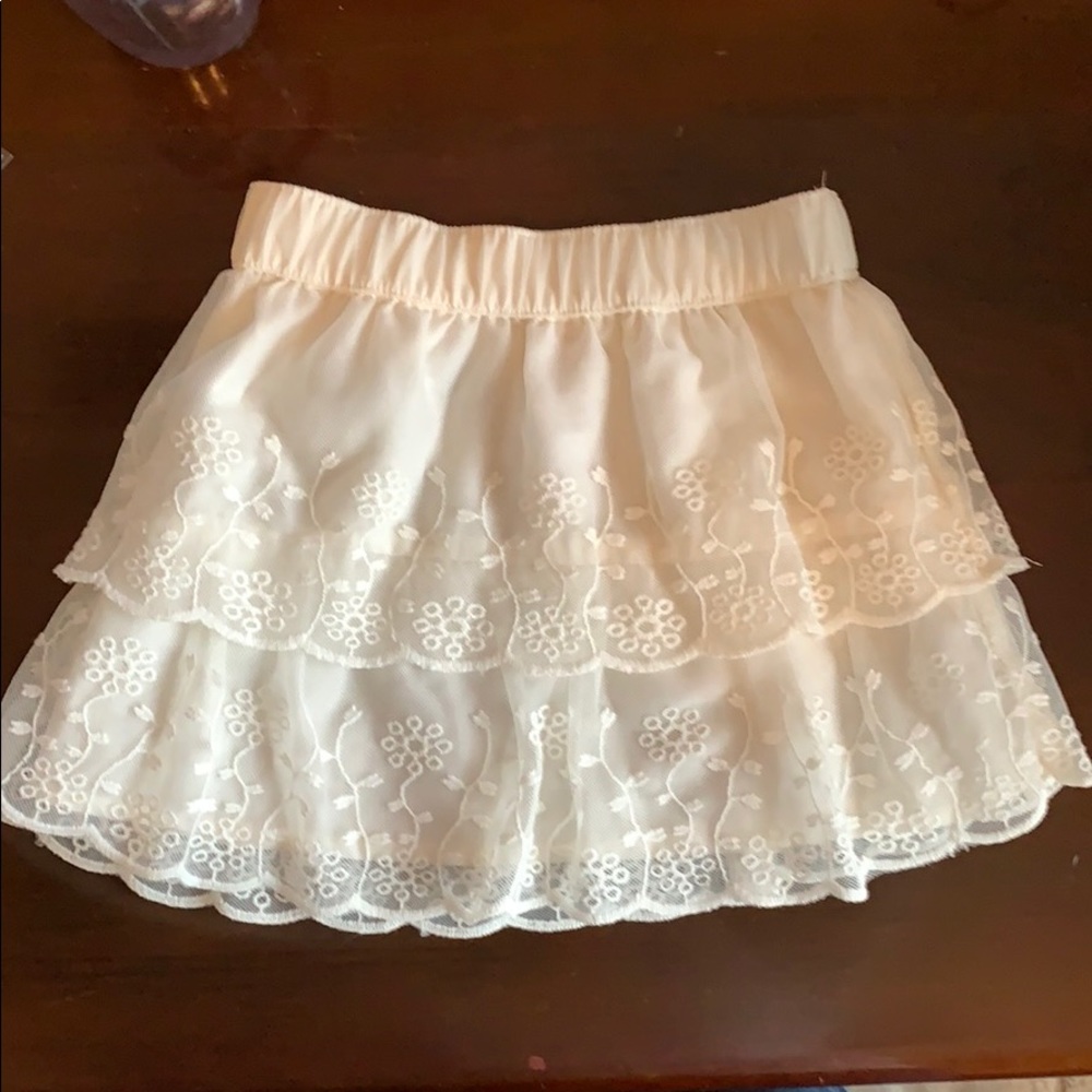 Carters 3T cream skirt.